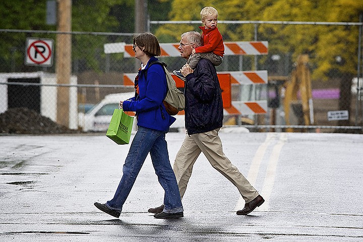 &lt;p&gt;JEROME A. POLLOS/Press Marcus von Sivers, 2, takes advantage of his elevated perspective to survey the downtown area Tuesday while traveling along Sherman Avenue in downtown Coeur d'Alene with his mother, Katharina von Sivers, and grandfather, Ernst-August Frede.&lt;/p&gt;