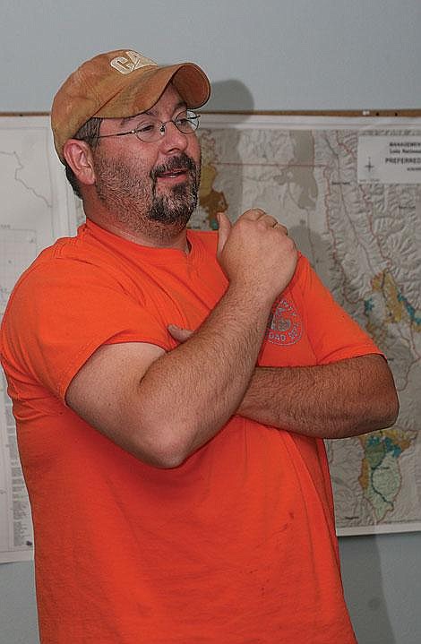 Photo by Nick Ianniello Tom Seliga works with his model airplane at his home Friday afternoon. Seliga is working to get the FAA to allow model airplane enthusiasts to fly their craft at the Mineral County Airport.