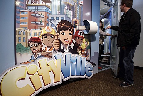 &lt;p&gt;Workers enter the CityVille game room at Zynga headquarters in San Francisco, Thursday. Based on papers filed Friday, Zynga, the online game maker behind &quot;FarmVille&quot; and other popular Facebook pastimes, is going public.&lt;/p&gt;