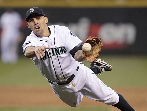 &lt;p&gt;Mariners second baseman Jack Wilson makes an off-balance throw to first base in the eighth inning Saturday night. The San Diego Padres won at Seattle 1-0.&lt;/p&gt;