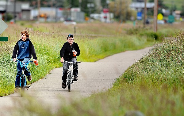 &lt;p&gt;From left, Nikolas Domokos, 13, and Kolby Jones, 10, both of
Marion, ride the Great Northern Historic Trail from Kalispell to
Kila.&lt;/p&gt;