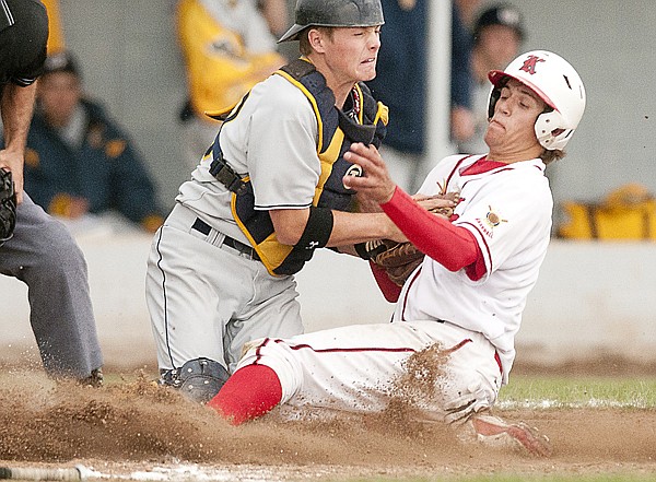 &lt;p&gt;Kalispell Lakers pitcher Joe Pistorese is tagged out a home in
the second inning against the Great Falls Chargers at Griffin Park
Wednesday night.&lt;/p&gt;