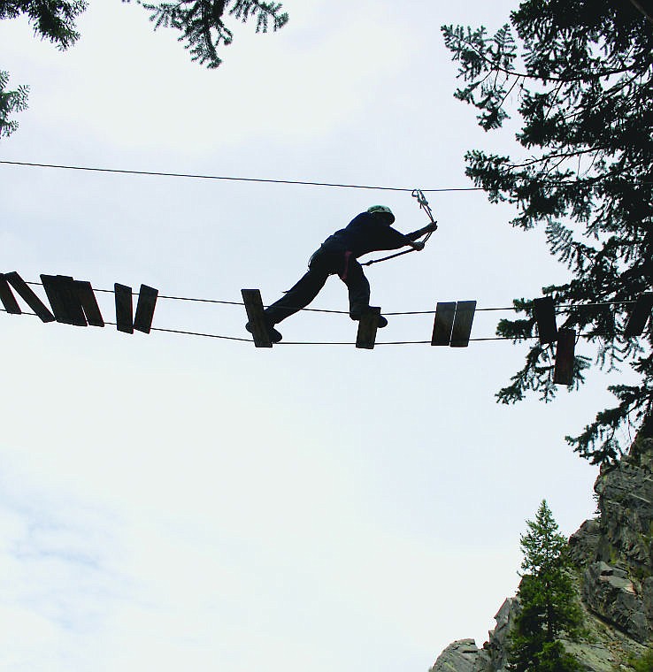 &lt;p&gt;A climber attempts the Indiana Jones bridge on the high element rope course. The obstacle was a favorite among trainees during the Camp Bighorn training week.&lt;/p&gt;