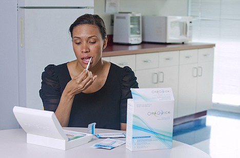 &lt;p&gt;In this undated handout photo provided by Orasure a model demonstrates the OraQuick test, which detects the presence of HIV in saliva collected using a mouth swab. The test is designed to return a result within 20 to 40 minutes. The U.S. Food and Drug Administration approved the first over-the-counter HIV test Tuesday, July 3, 2012, allowing Americans to check themselves for the virus that causes AIDS in the privacy of their homes. (AP Photo/Orasure, Chuck Zovko)&lt;/p&gt;