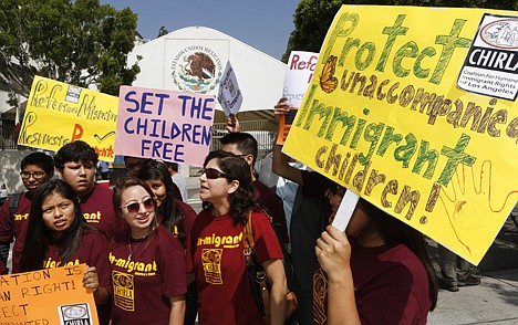 &lt;p&gt;Immigration activists with Coalition for Humane Immigrant Rights of Los Angeles (CHIRLA) demand the Mexican government take more measures to protect and respect the rights of unaccompanied minors and families crossing Mexico's territory, during a protest Thursday outside the Mexican consulate in Los Angeles.&lt;/p&gt;