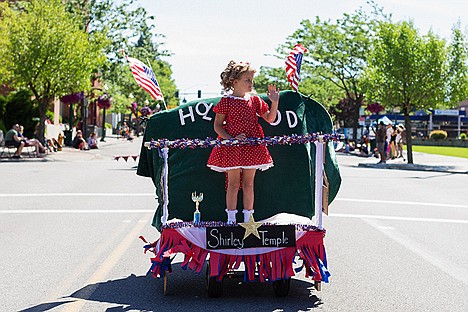 &lt;p&gt;Dressed as Shirley Temple, Elsa Laker, 5, of Coeur d&#146;Alene, waves to on-lookers from her personal float.&lt;/p&gt;