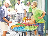 &lt;p&gt;Joni Barnes makes sure every golfer only takes one shot glass of schnapps.&lt;/p&gt;