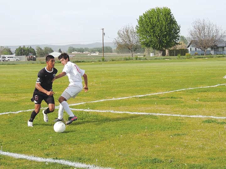 Wahluke Forward Ramon Bravo drives toward the goal with the ball.