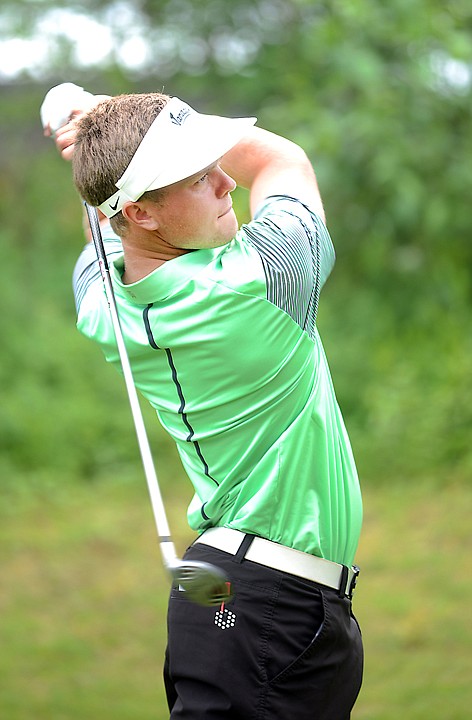 <p>Ryan Porch of Kalispell tees off in the Fourth of July Golf Tournament at the Whitefish Lake Golf Club on Saturday. (Brenda Ahearn/Daily Inter Lake)</p>