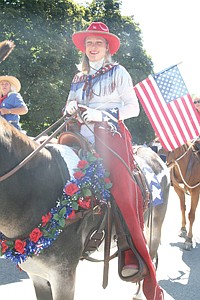 &lt;p&gt;Kit Branch is decked out in red, white and blue and so is her steed, Bugsy. Branch is a member of the Back-Country Horsemen, which took part in the parade.&lt;/p&gt;