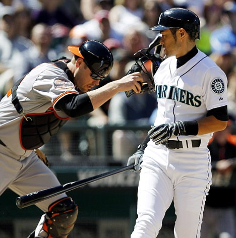 &lt;p&gt;Seattle Mariners' Ichiro Suzuki, right, looks back as Baltimore Orioles catcher Matt Wieters looks for the dropped third strike in the eighth inning during a baseball game, Wednesday, July 4, 2012, in Seattle. Suzuki was out on the play. The Orioles won 4-2. (AP Photo/Elaine Thompson)&lt;/p&gt;