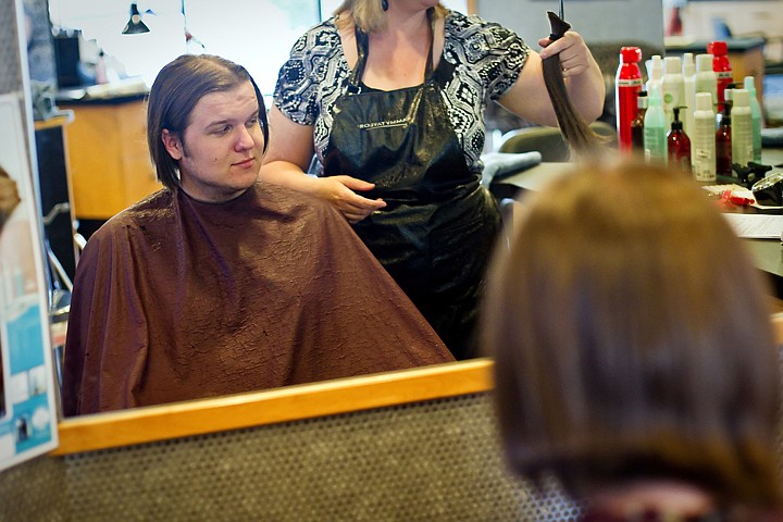 &lt;p&gt;JEROME A. POLLOS/Press Alex McNeely, 19, glances over at the 14 inches of hair he had been growing since he was 13 years old after having it cut Monday by Tamara Michael at LaTourrette's Styling Salon in Coeur d'Alene. McNeely donated his hair to Locks of Love, a non-profit organization that provides hairpieces to financially disadvantaged children suffering from long-term medical hair loss from any diagnosis.&lt;/p&gt;