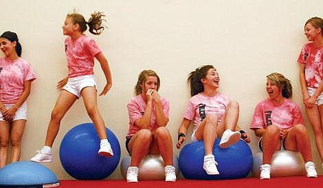 Young Cheerleaders Working Out in Sports Club, Group of