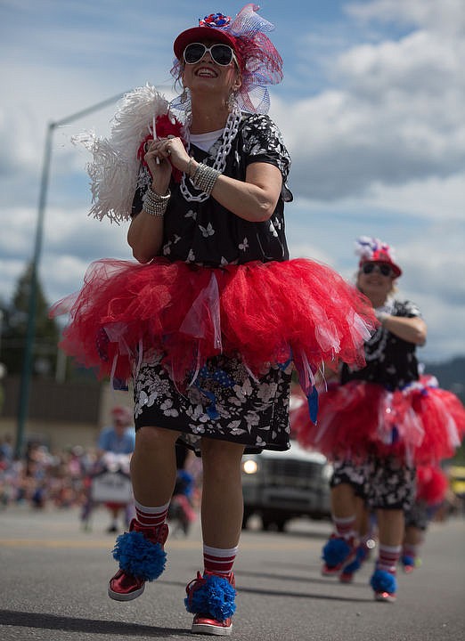 <p>KATIE HARTWIG/Press An estimated 30,000 people watch bands, military units, horses, and more participate in Coeur d'Alene's American Heroes Parade, Monday, July 4, 2016 on Sherman Avenue.</p>