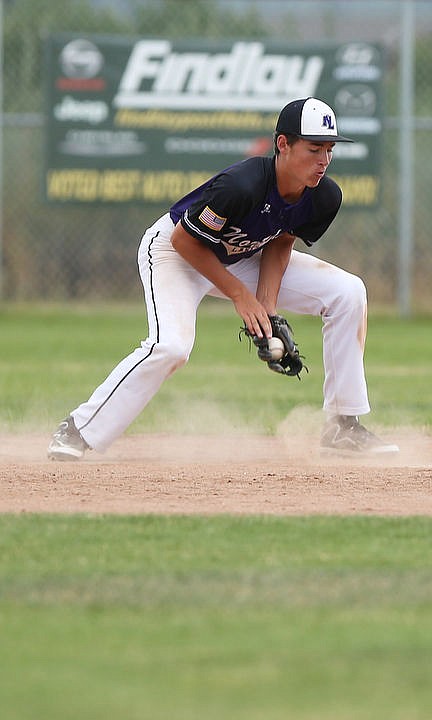 <p>LOREN BENOIT/Press The Prairie Cardinals square-off against the Northern Lakes Mountaineers during an American Legion doubleheader Tuesday evening at Post Falls High School.</p>