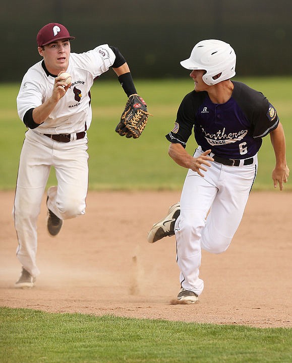 <p>LOREN BENOIT/Press The Prairie Cardinals square-off against the Northern Lakes Mountaineers during an American Legion doubleheader Tuesday evening at Post Falls High School.</p>