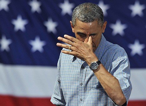 &lt;p&gt;President Barack Obama wipes sweat from his eye after a speech at Washington Park in Sandusky, Ohio, Thursday. Obama is on a two-day bus trip through Ohio and Pennsylvania.&lt;/p&gt;