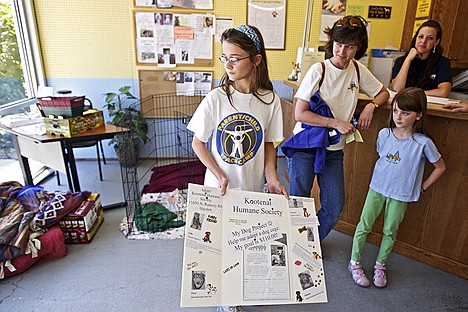 &lt;p&gt;Sarah Hoatson, 11, raised $42.88 for the Kootenai Humane Society by playing her violin Wednesday in Coeur d'Alene's City Park. Hoatson was trying to raise $110, but was stopped by a city employee before she reached her goal due to not having a permit. Sarah, her mother Karen and sister Hannah, 8, delivered the funds Thursday to the Humane Society.&lt;/p&gt;