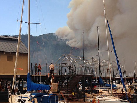 &lt;p&gt;People line the dock at MacDonald&#146;s Hudson Bay Resort and Marina and watch as a wildfire spreads across the Cape Horn mountainside Sunday.&lt;/p&gt;