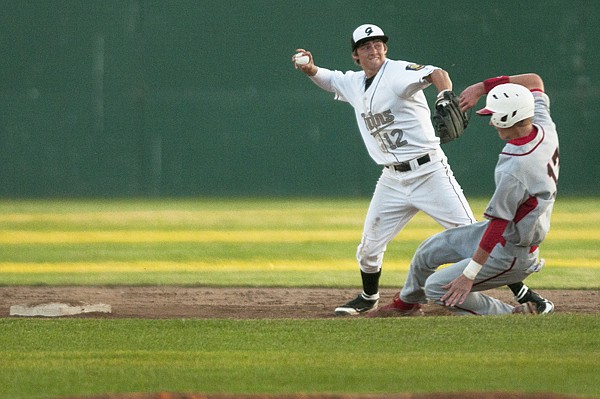 &lt;p&gt;Twins second baseman Kyler Blades turns a double play to end the
top of the third inning against the Kalispell Lakers at home
Wednesday night.&lt;/p&gt;