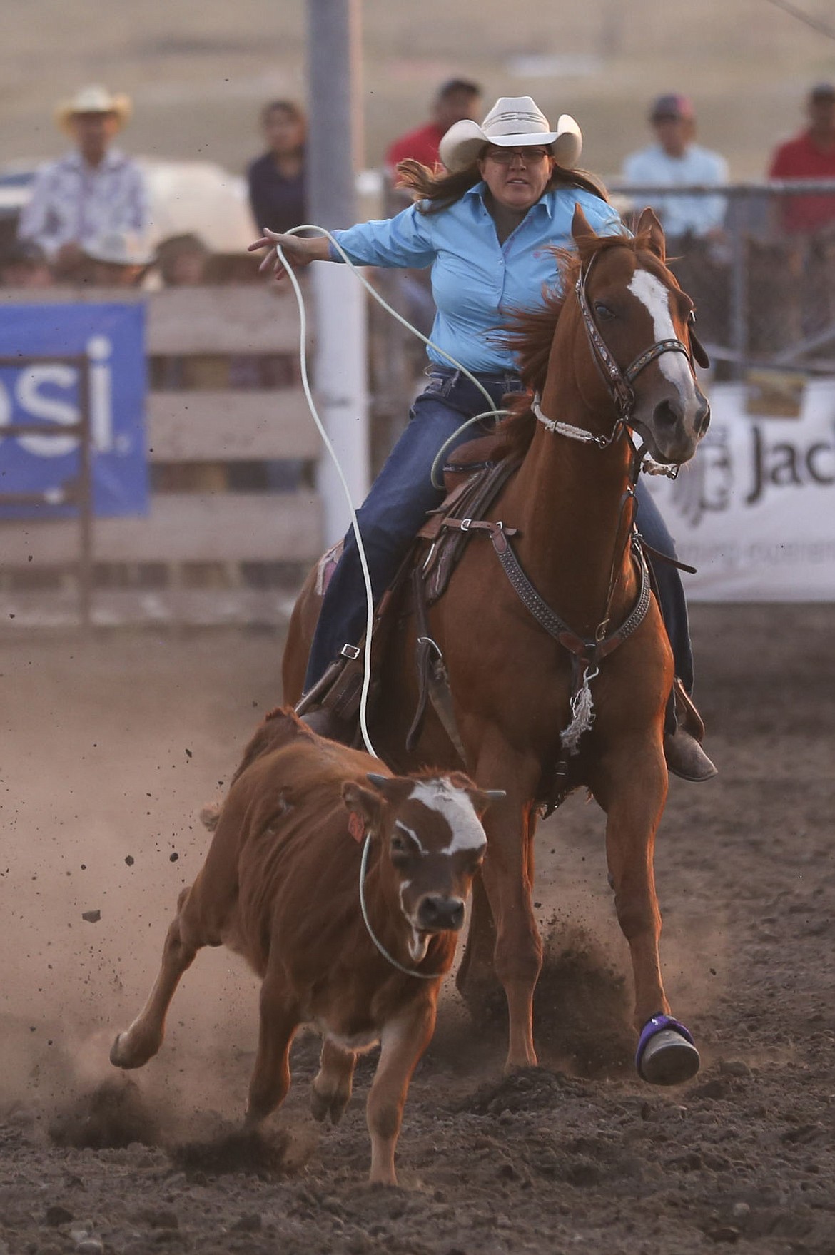 &lt;p&gt;Jimi Champ of Cut Bank ropes a calf in the ladies breakaway competition on Thursday.&lt;/p&gt;