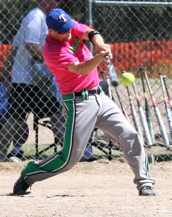 &lt;p&gt;Jake Lenz of the Loco Joe's softball team makes contact with a
pitch during the annual St. Regis softball tournament Saturday
afternoon.&lt;/p&gt;