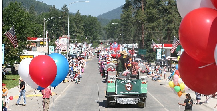 &lt;p&gt;From above, spectators watch floats pass by during the St. Regis
Fourth of July Parade Monday afternoon. &#160;The annual parade draws
people from all over the country.&#160;&lt;/p&gt;