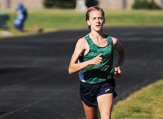 &lt;p&gt;Glacier's Annie Hill cruises to the finish line to win the Glacier Invitational on October 14, 2015. (Aaric Bryan/Daily Inter Lake)&lt;/p&gt;