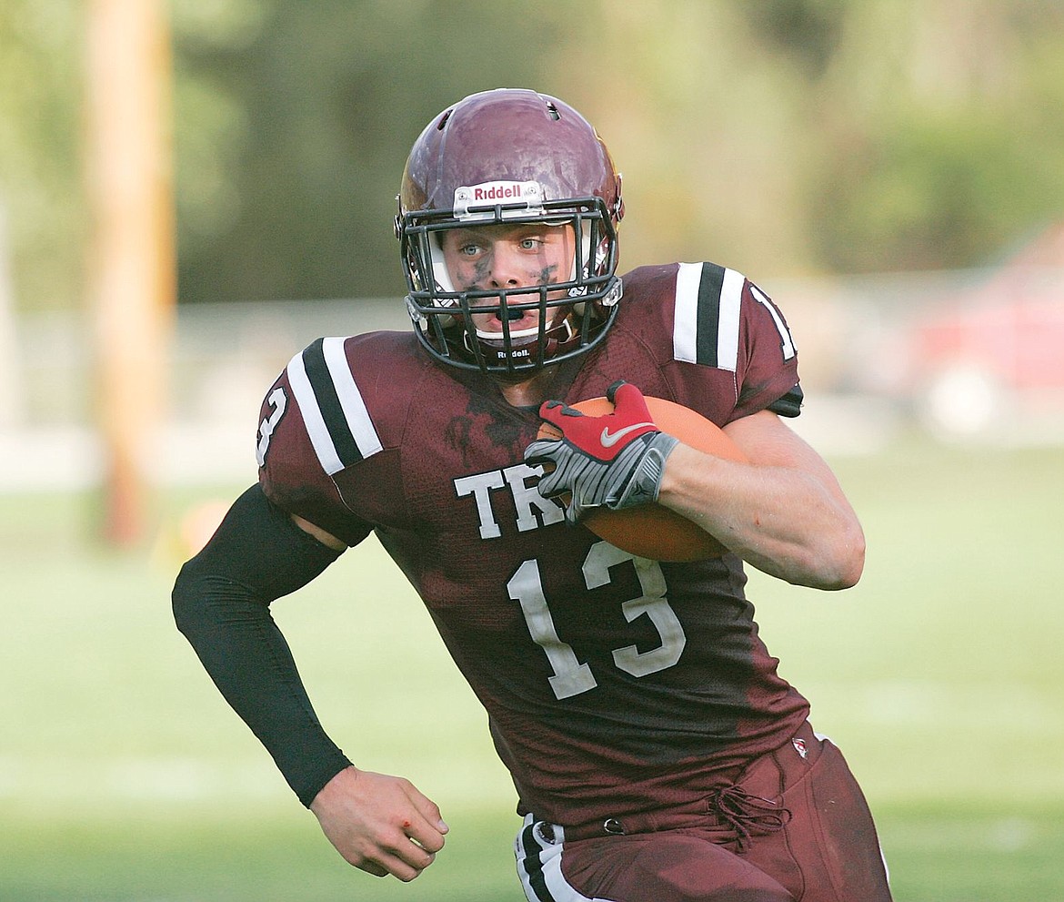 &lt;p&gt;Troy quarterback Sean Opland runs the ball during a game this fall. Opland, who played QB, running back, linebacker and safety for the Trojans, leads a Montana-heavy class of recruits for Montana State. Opland was one of a handful of recruits to stick with the Bobcats through a coaching change this fall. (File photo)&lt;/p&gt;