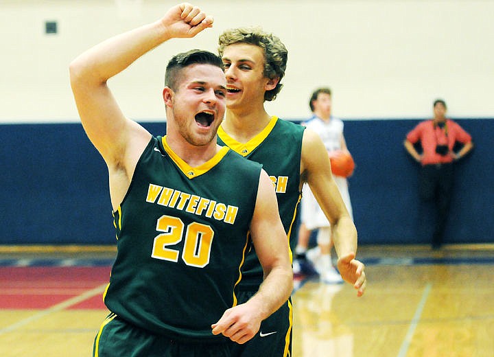 &lt;p&gt;Luke May and Jansen Anderson celebrate the Whitefish Bulldogs' 56-44 victory over the Wildcats in Columbia Falls on Thursday. (Aaric Bryan/Daily Inter Lake).&lt;/p&gt;