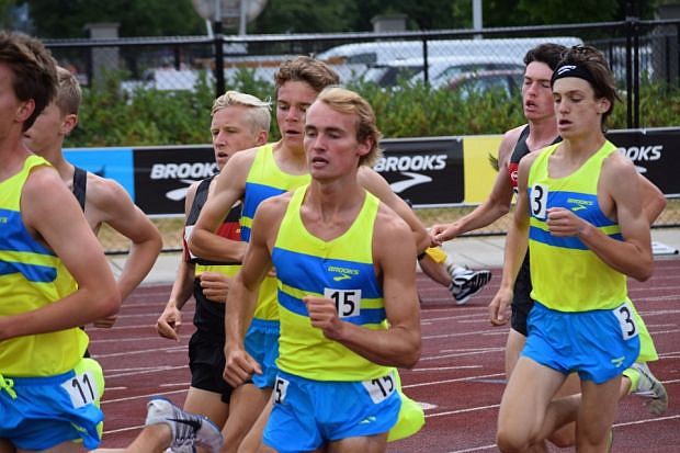 &lt;p&gt;Flathead senior Jake Perrin keeps pace with the pack in the boys two mile run at the Brooks PR Invitational on Saturday in Renton, Wash. Perrin finished 12th in 8:58.09, the fastest time in Montana history. (Travis Miller photo)&lt;/p&gt;