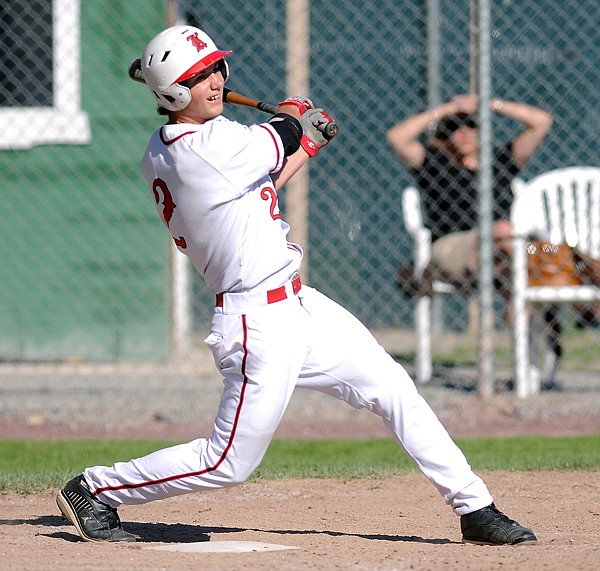 Cody Dopps hits a single during the top of the third inning in the game against the Chino Red on Wednesday in Whitefish.