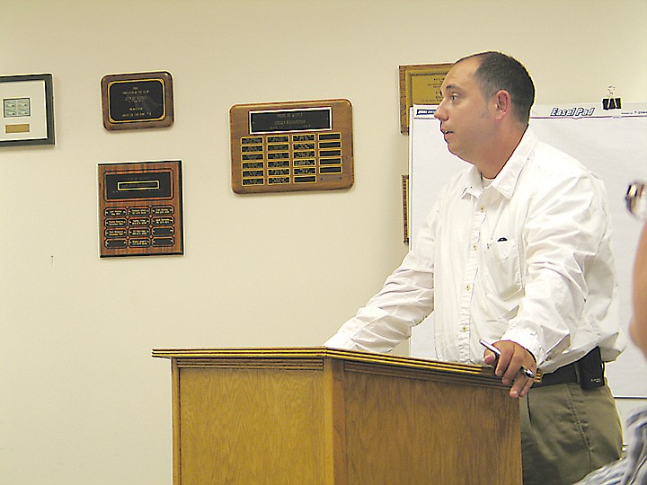 Brian Williamson, Protection 1's president and owner, speaks to
the Quincy City Council during a recent meeting.