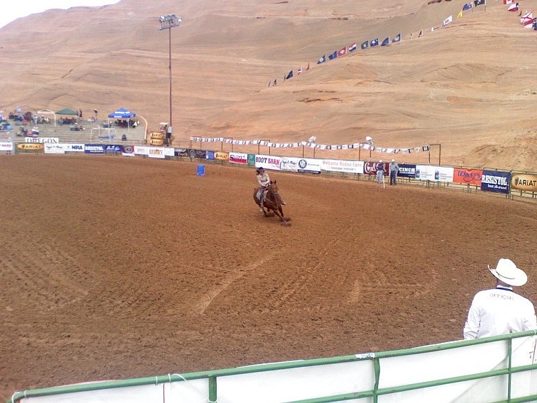 Abby Knight competes in barrel racing during the fourth round of the Junior Rodeo Nationals in Gallup, N.M.