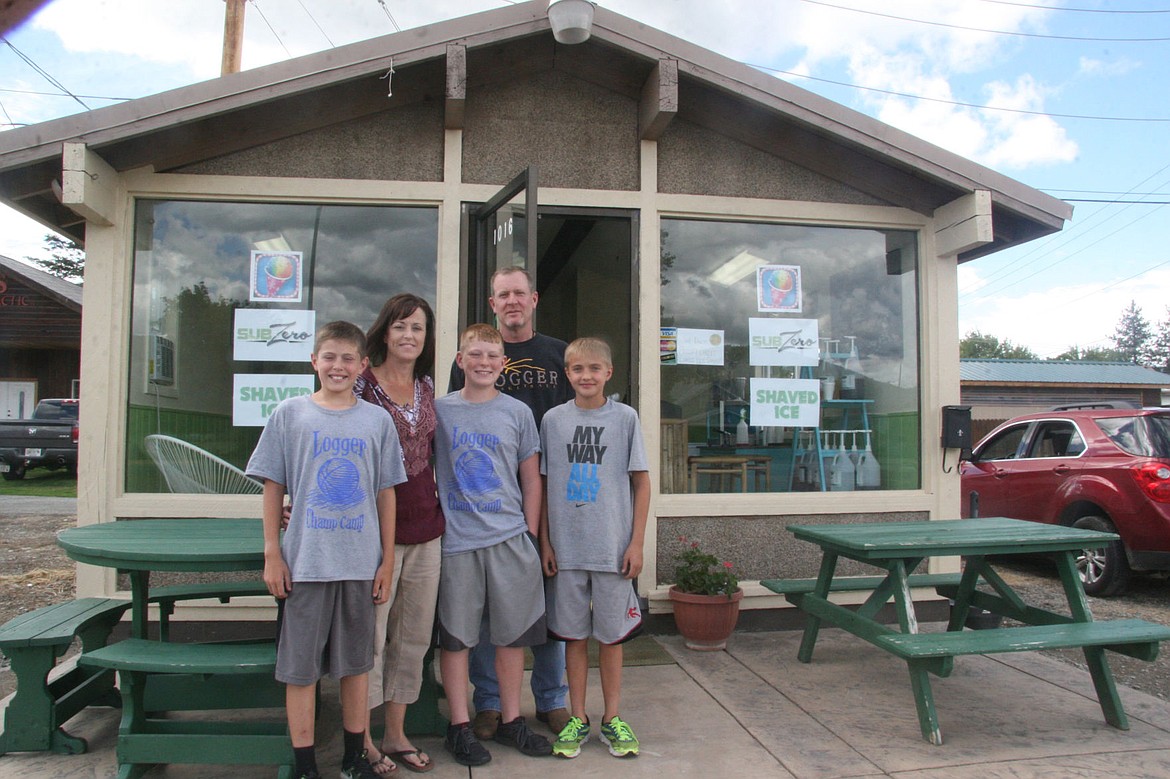 &lt;p&gt;From left, Trevor, Paula, Ryan and Chad Collins, with Luke DeShazer stand at the Sub Zero shaved-ice shop on U.S. 2. (Bethany Rolfson/The Western News)&lt;/p&gt;