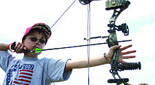 Alex Salois, 13, takes aim at a target during the Mission Valley Archery Fair last weekend in Polson.