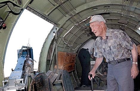 Don Siblerud walks through the belly of a B-17 Friday evening at Glacier Park International Airport. Siblerud, who was born and raised in the Flathead Valley, trained as a pilot and navigator in a B-17 during World War II and flew two missions during the war on a B-24 bomber. The two planes will be on display all weekend at the Semitool hangar north of the main airport. Karen Nichols/Daily Inter Lake