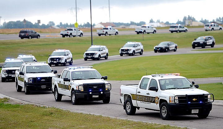 &lt;p&gt;Members of the first responder community were out in force on Thursday morning as they lined up at Glacier High School and then processed down Old Reserve Drive for the funeral procession of Brad Treat, 38, a law-enforcement officer with the U.S. Forest Service who died outside Glacier National Park on June 29, as a result of an encounter with a bear.&lt;/p&gt;