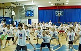 High school coaches teach basics to area youth