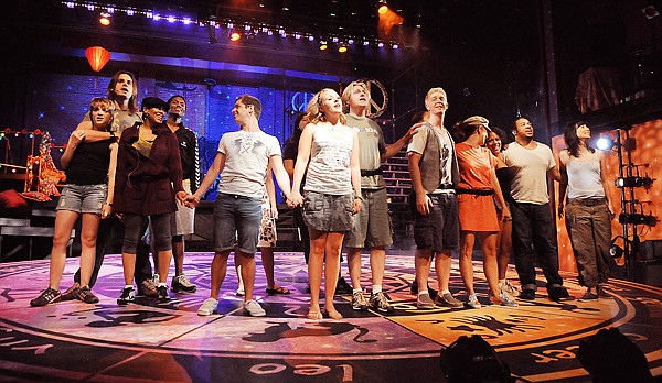 Tracy McDowell of New York City, center, sings lead in Good Morning Starshine as she and cast members rehearse Hair on Thursday at the Whitefish Theater.