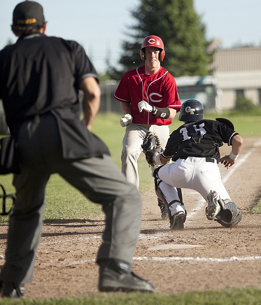 &lt;p&gt;Glacier Twins catcher Jim Jumper tags out a Spokane Cannons
runner who tagged up after a fly ball to left field in the top of
the second inning at Memorial Park Friday night.&lt;/p&gt;