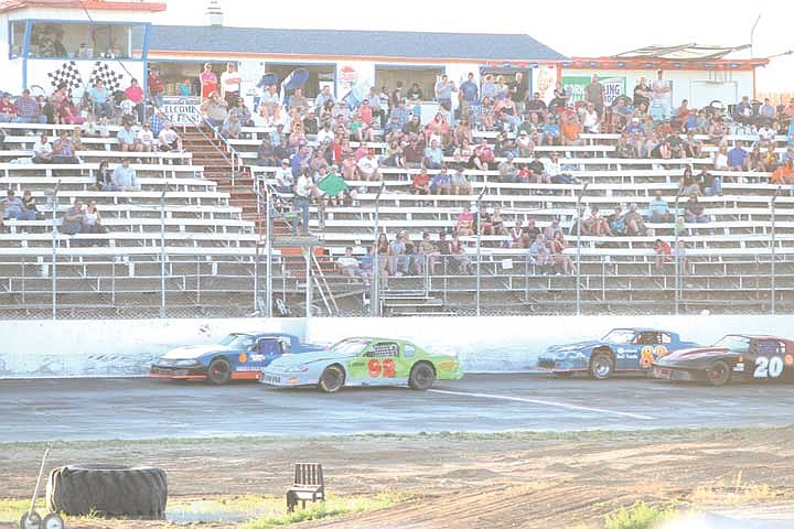 The racing action begins as drivers in the Pepsi Street Stocks get the green flag.