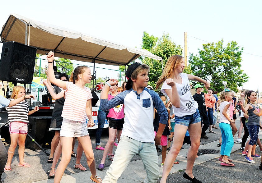 <p>About 35 people of all ages danced during the flash mob. (Aaric Bryan/Daily Inter Lake)</p>