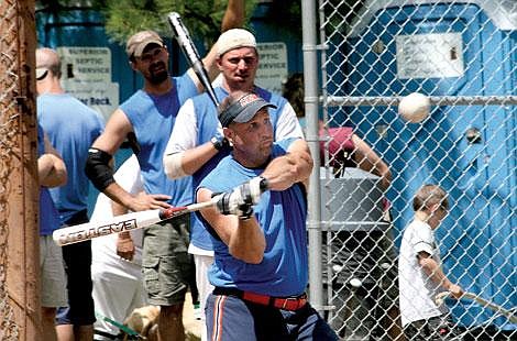 Nick Ianniello/Mineral Independent J.J. Fields takes a swing at the ball during the Traveler&#146;s second game of the Firecracker Softball Tournament Saturday afternoon. The Traveler&#146;s lost both their first and second games during the three game guarantee tournament, but came back to win their third game Sunday.