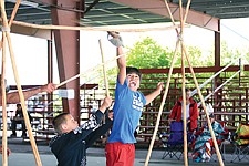 Greg Weatherwax jumps to score in double ball during Thursday's Old Style Day, part of the Arlee Powwow that went from June 30 through July 4.