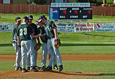 The Mission Valley Mariners huddle at the pitchers mound before an inning during the Firecracker Tournament last weekend in Polson.