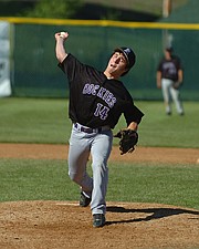 Nick Grogan throws a pitch for the Mission Valley Rockies last weekend in Polson.