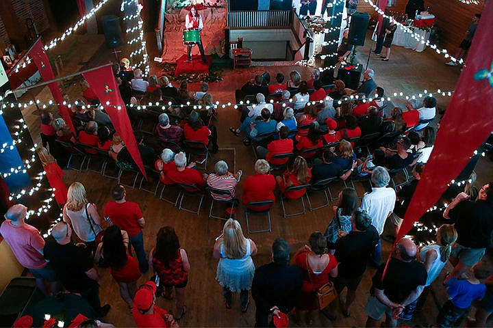 &lt;p&gt;Michael Koep, author of &#147;Leaves of Fire&#148;, speaks to the audience at the book&#146;s launch in Coeur d&#146;Alene at the Wiggett Building Friday. People attending were encouraged to wear red in spirit of the event and a best dressed in red contest was incorporated.&lt;/p&gt;