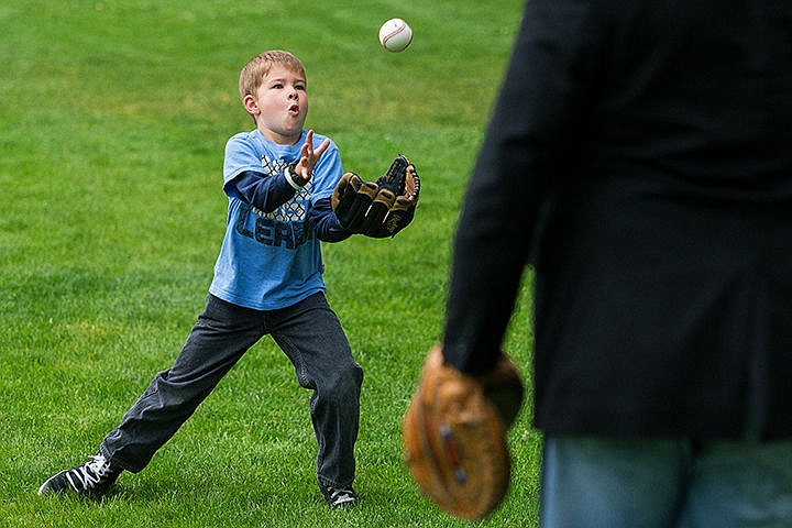 &lt;p&gt;John Carrington, 6, concentrates on the ball while playing catch with his grandfather Tuesday at McEuen Park in Coeur d&#146;Alene. To order prints, go to http://cdapress.com/photojournalism.&lt;/p&gt;