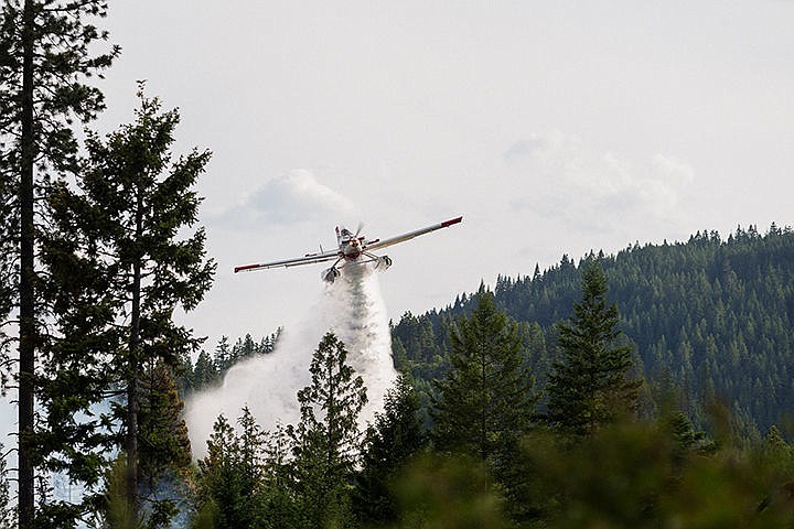 &lt;p&gt;A single engine air tanker (SEAT) plane drops water on a wildland fire more than 10 acres in size southeast of the intersection of Highway 41 and Highway 54 in Spirit Lake on Monday. Two SEAT planes and a helicopter offered air support to more than 40 firefighters from Timberlake Fire Protection District, Hauser Lake Fire Protection District, Spirit Lake Fire Protection District, Northern Lakes Fire Protection District, Kootenai Fire and Rescue, Idaho Department of Lands, U.S. Forest Service and Coeur d&#146;Alene Helitack to battle the blaze into the evening.&lt;/p&gt;